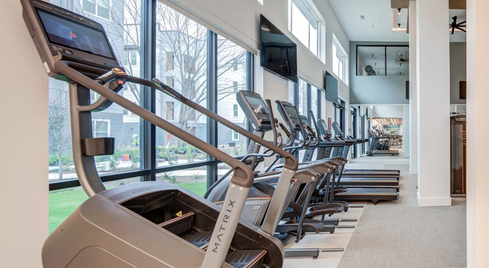 Matrix cardio row of stair climber, ellipticals and treadmills in a Texas apartment community