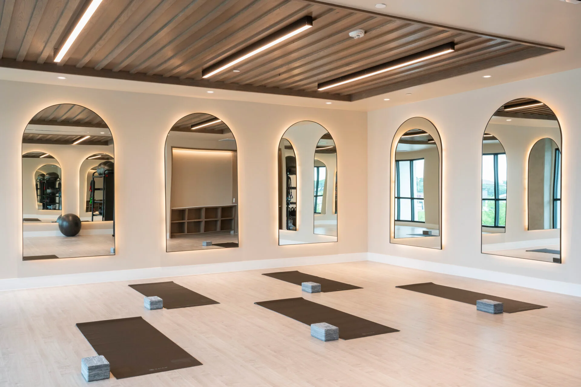 Yoga and stretching studio in a Dallas, Texas apartment community with exercise mats and foam blocks