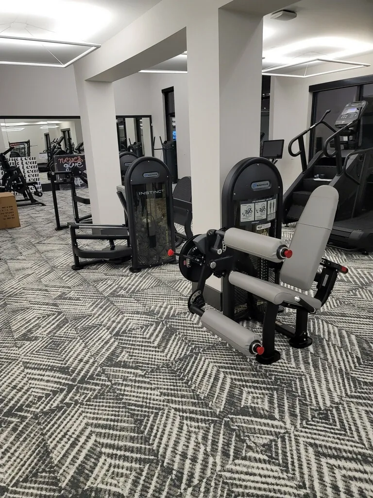 Nautilus Instinct strength machines and a stair-mill in an Apopka, Florida community fitness center