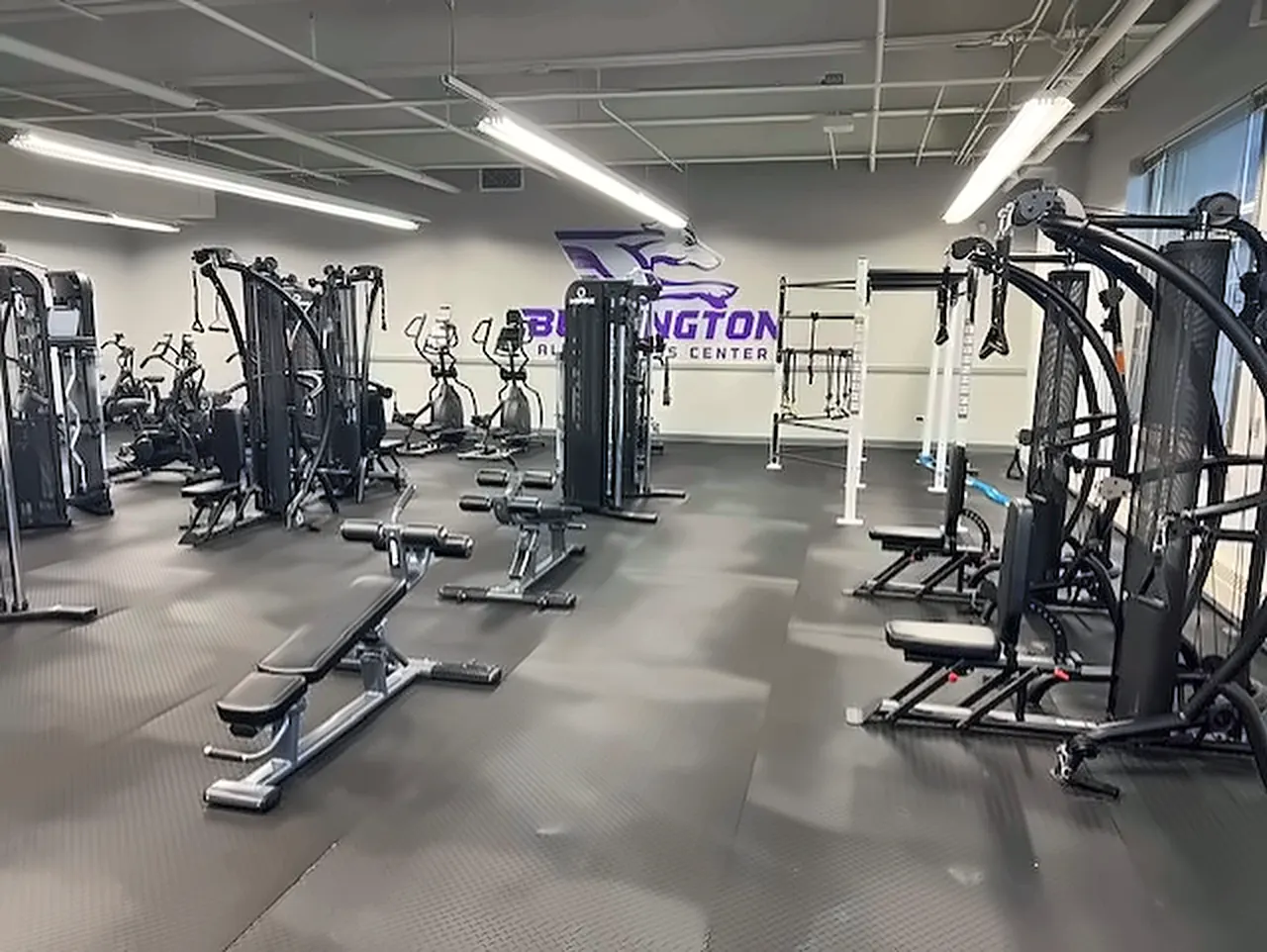 Aldo Leopold Intermediate School fitness room in Burlington, IA: multi-gyms, benches and ellipticals