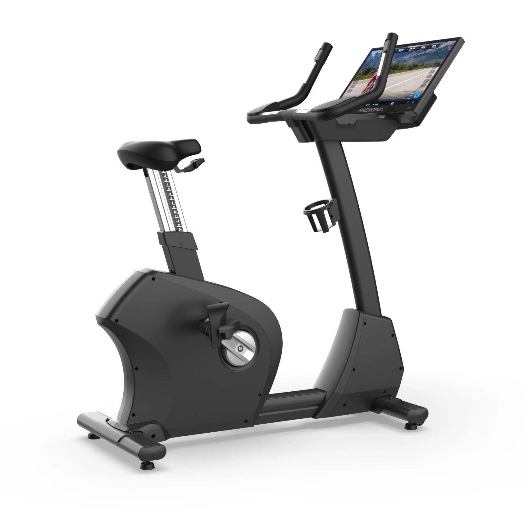 Black FreeMotion upright exercise bike with a large touchscreen console and adjustable seat post