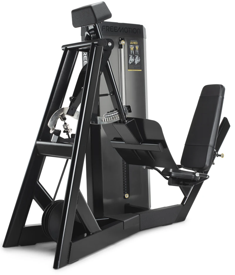 Black FreeMotion EPIC Selectorized leg press machine with an angled foot platform