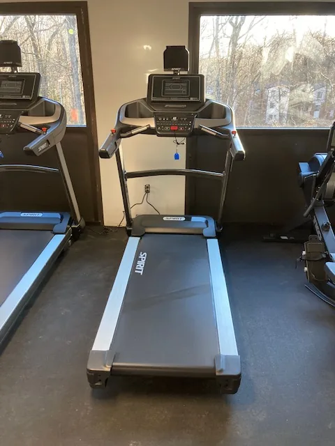 Treadmill facing a window at a Groton, Connecticut apartment gym