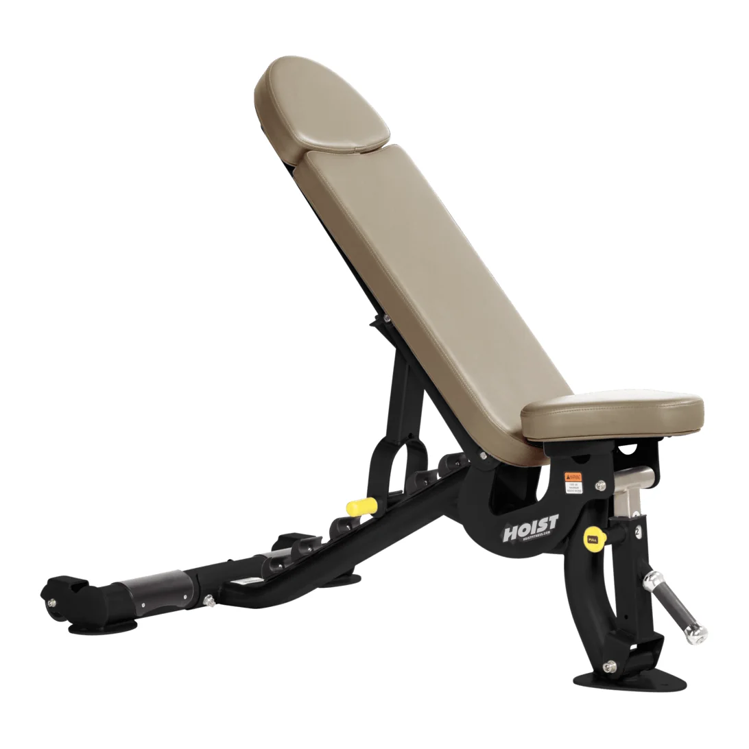 Black HOIST CF-3160 flat and incline bench with beige upholstery raised to an incline