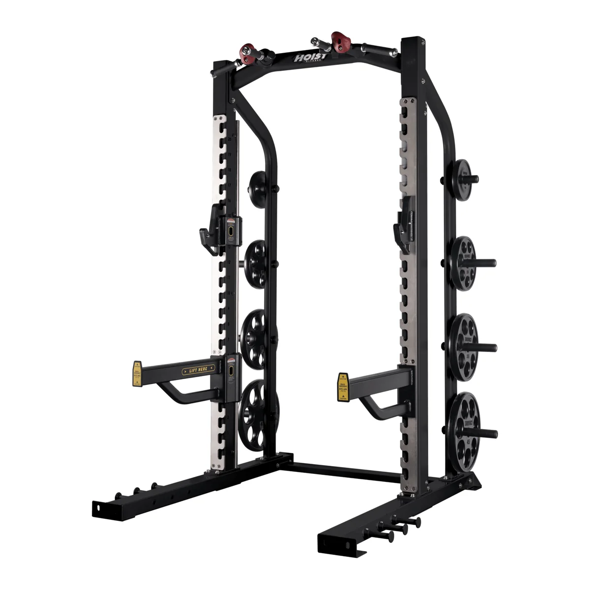 Black HOIST CF-3365 half rack with weight plates, safety arms and a pull-up station