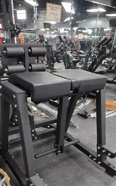 Hip thrust and glute-ham bench in the strength area of a Jacksonville, Florida commercial gym