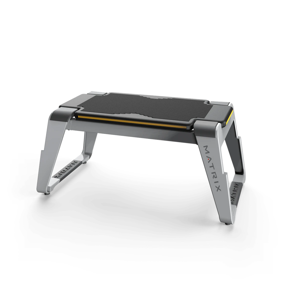 Gray and black Matrix Connexus Step+, a low stability step with a textured platform and cast-aluminum legs
