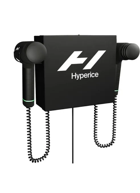 Hyperice wall-mounted percussion therapy station with two tethered massage guns on a black panel