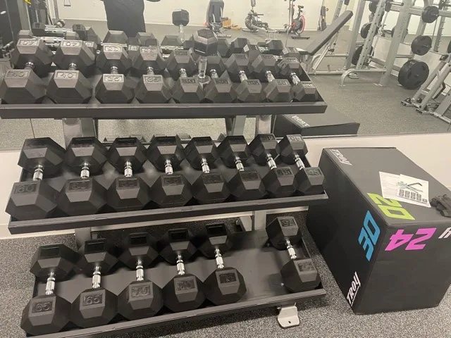 Two-tier dumbbell racks and a plyometric box at a San Clemente, California municipal fitness facility