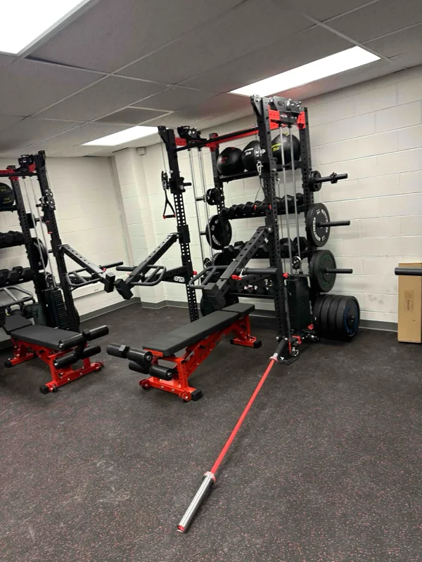 Power racks and benches with packaging still on the floor during installation at a New York school