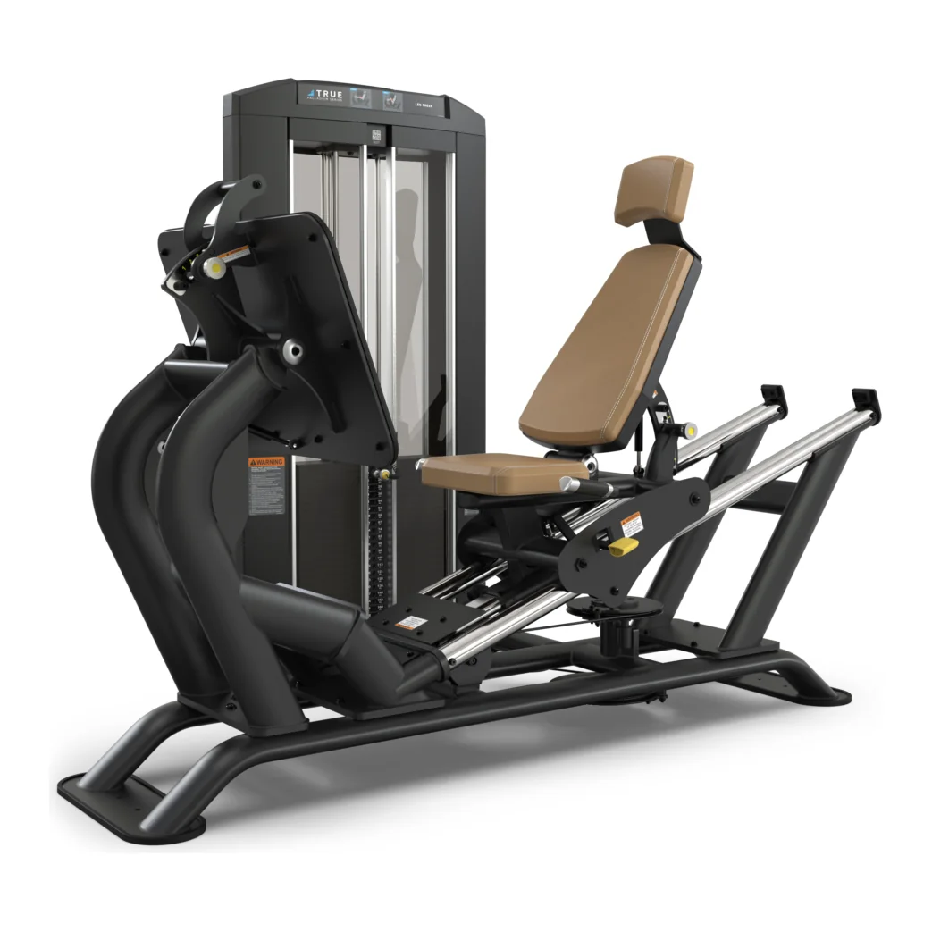 Black TRUE Palladium SPL-0300 seated leg press with a tan seat, a large foot plate and a weight stack tower