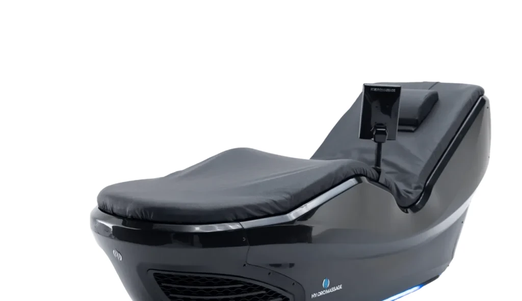 Close-up of a black HydroMassage 440 G3 Lounge water-massage chair with a small console arm and blue accent lighting