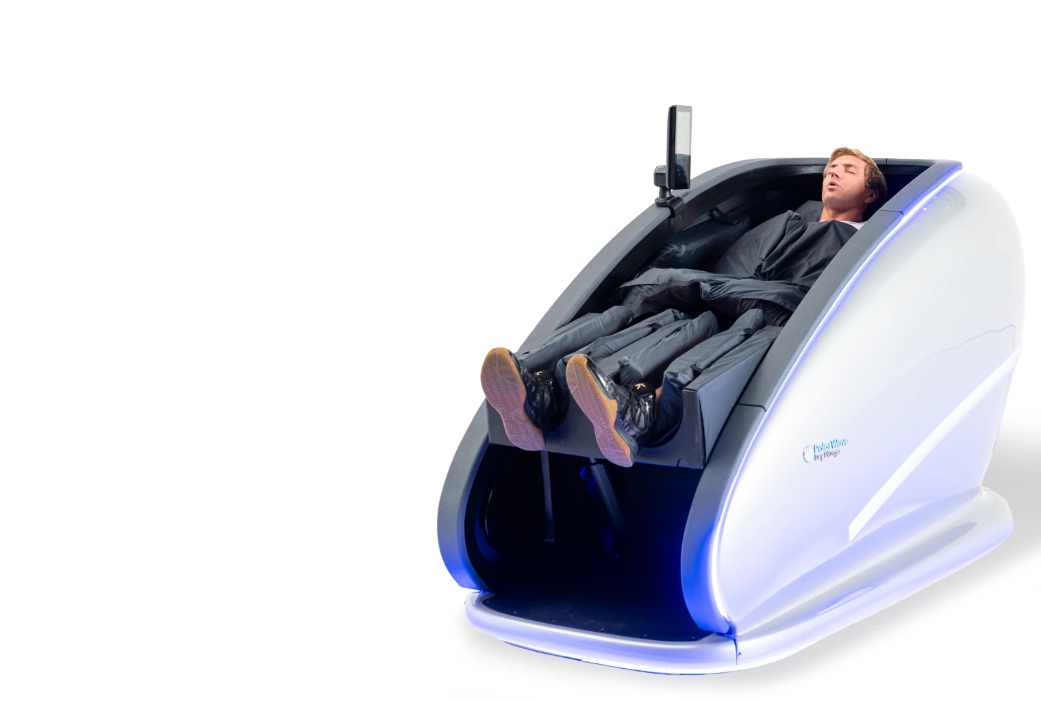 A man reclining fully clothed in a white PolarWave dry cold-plunge pod with blue accent lighting
